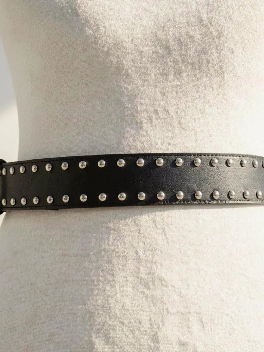 Y2K 2000s style Black leather studded cross belt with silver hardware